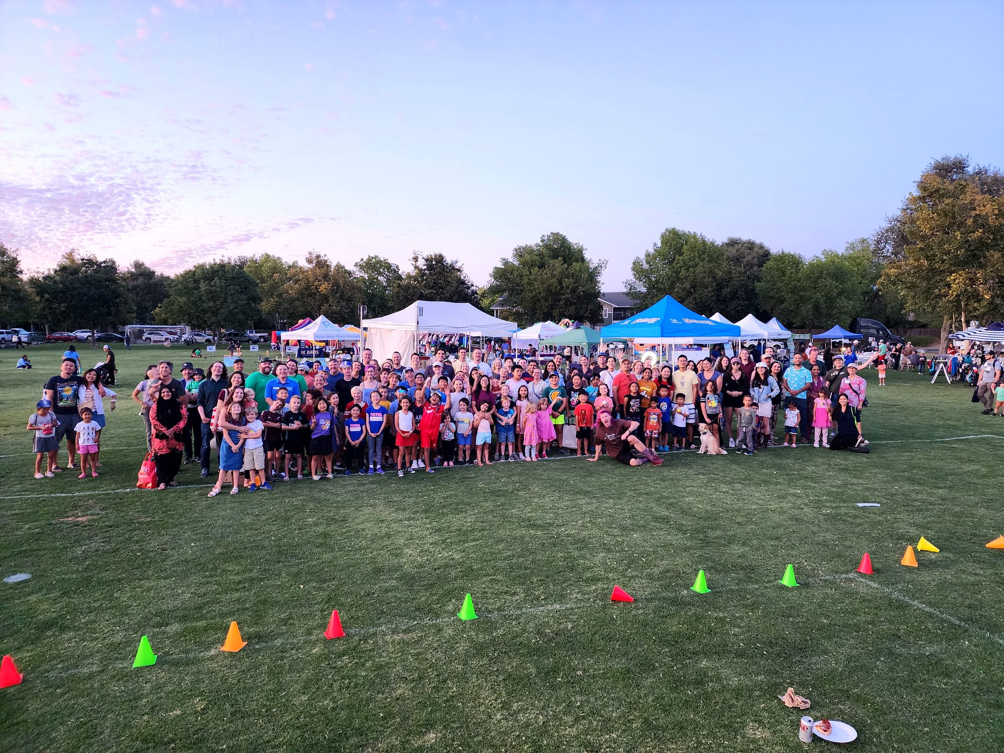 The whole community together at dusk after the Family Fun Fest